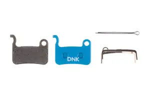Колодки гальмові дискові DNK LX, органіка (для Shimano M975/M800/M775/M585/S500) - Магазин ВелоБуча
